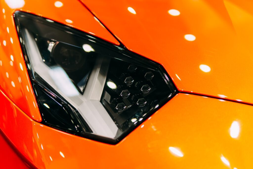 Head Lights Of Luxurious Orange Sports Car
